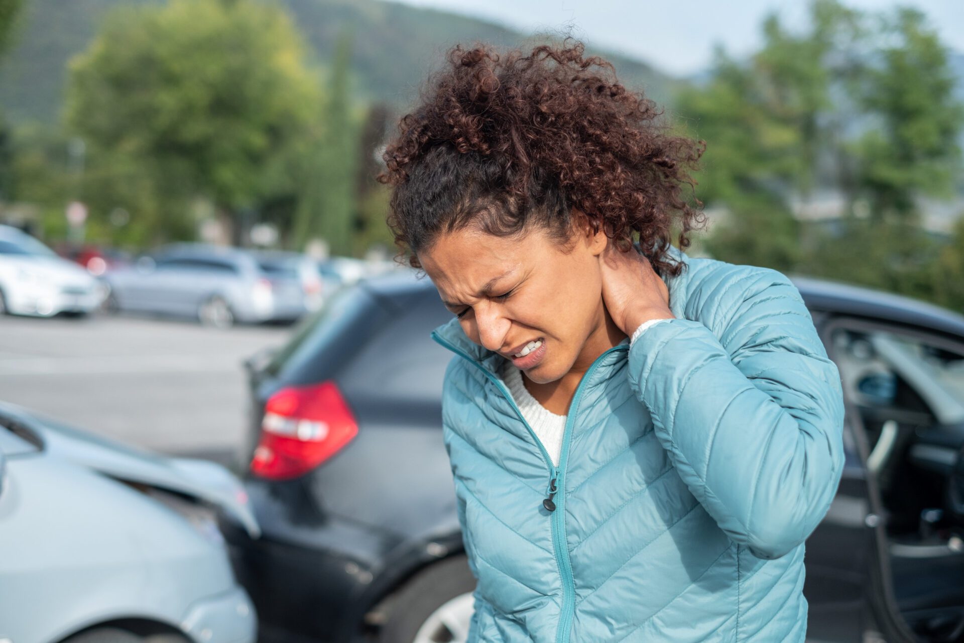 Rear-end collision Painful whiplash after fender bender car crash
