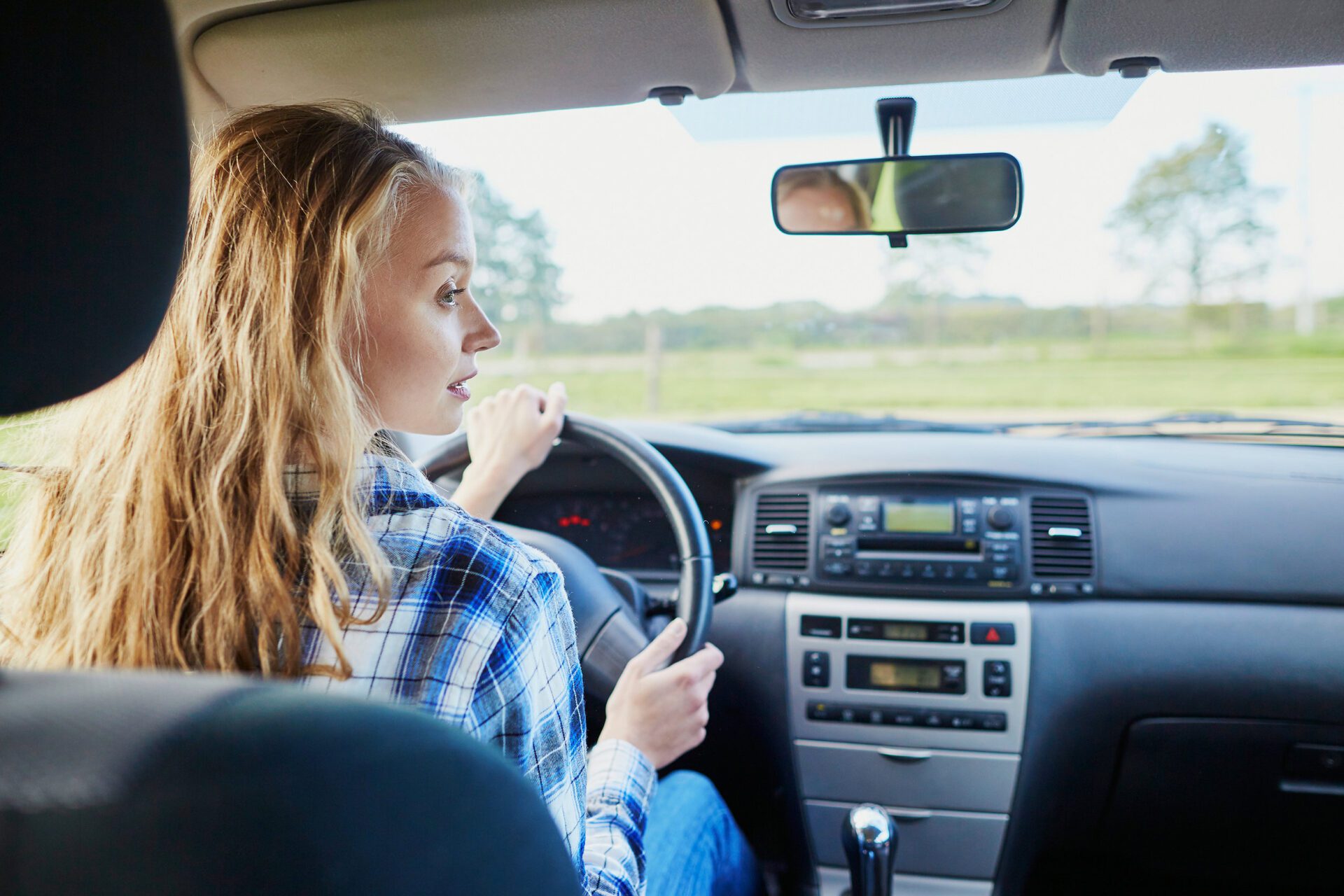 Rear-end collision Teen girl driving car