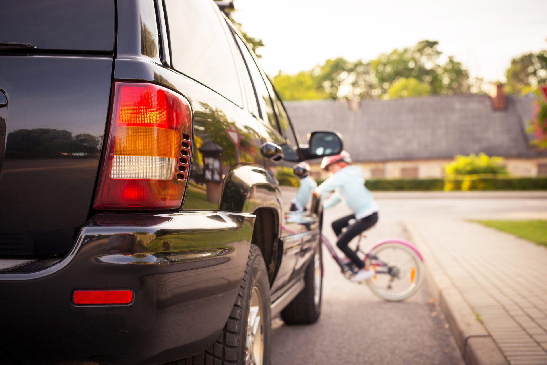 Accident. Girl on the bicycle crosses the road in front of a car Children Injured in Accidents