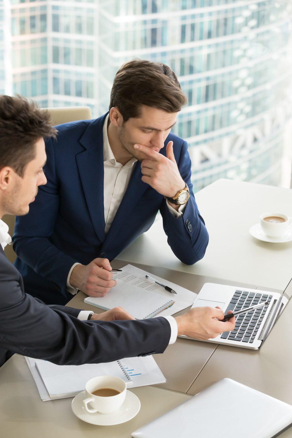 entrepreneurs-discussing-work-results-meeting entrepreneurs-discussing-work-results-meeting